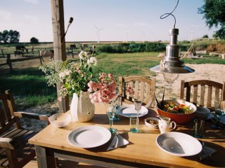 Genießen Sie biologisch leckeres Essen im Garten im Haus am Watt